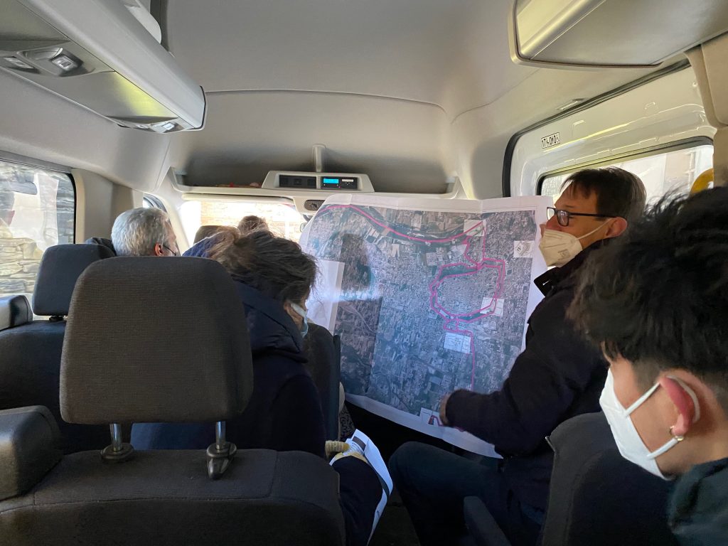 In the van, the engineer of Comune di Lucca explains us the project